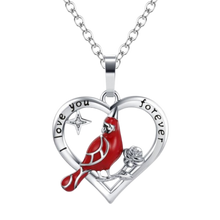 Load image into Gallery viewer, Heart-shaped pendant with a cardinal